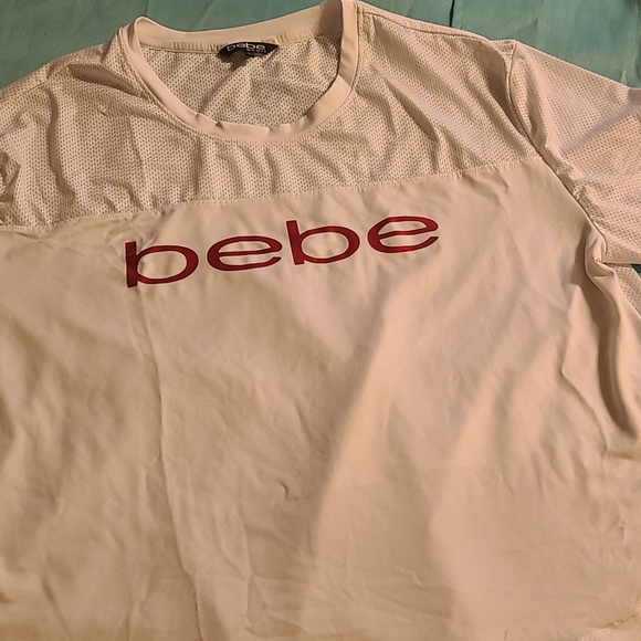 Bebe womens shirt size XL color White with Pink. Mesh back. - Picture 12 of 13